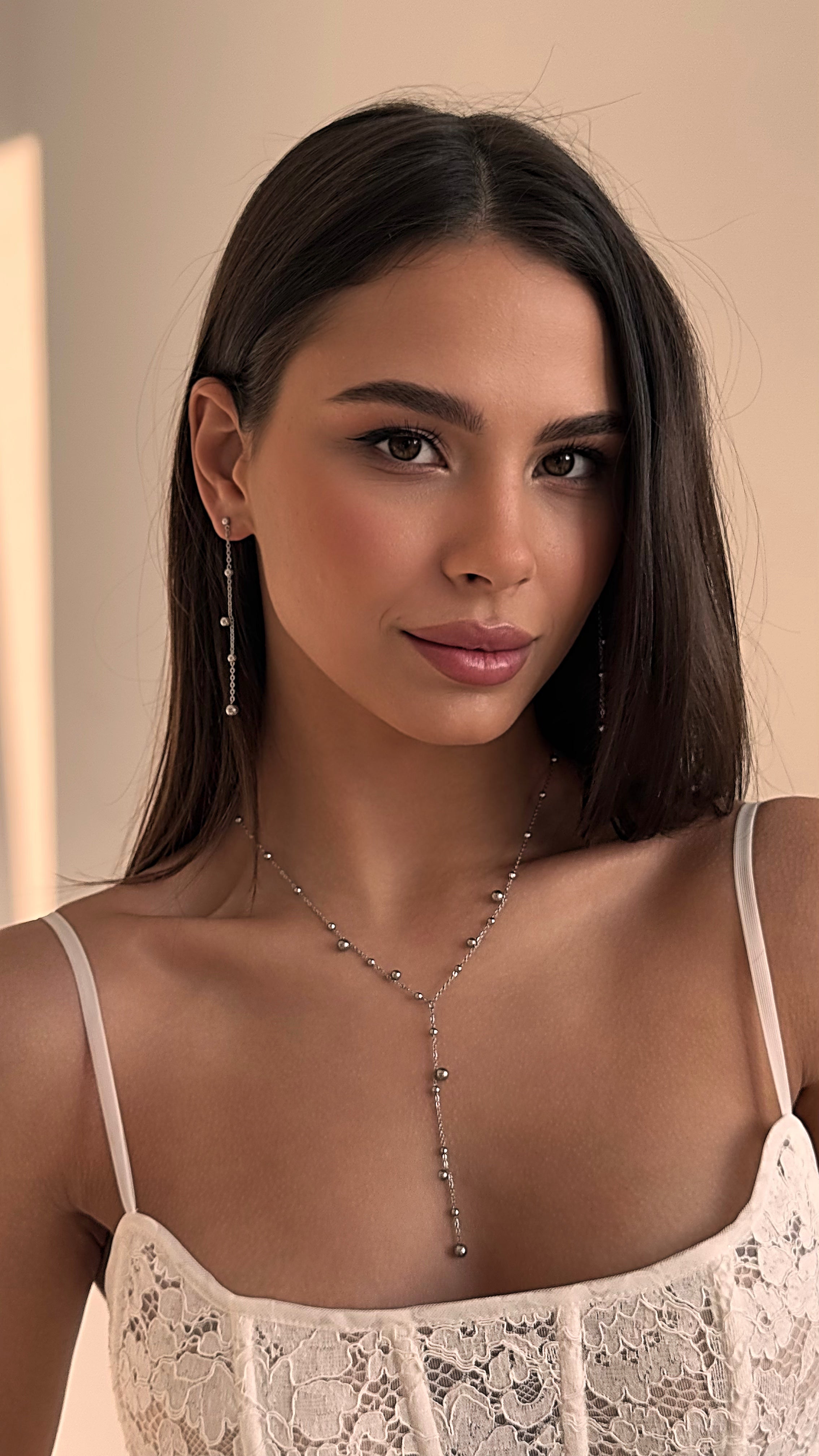Minimalist Y-shaped silver ball chain necklace with matching long stud earrings made of stainless steel – elegant jewelry set for women.