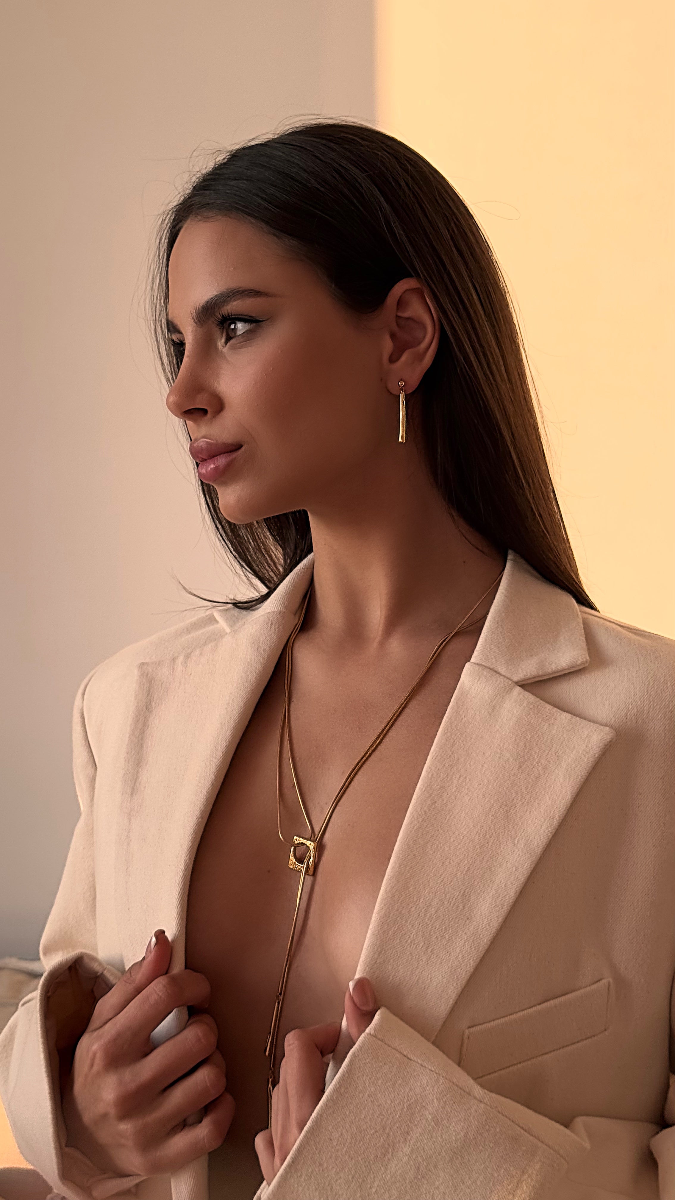 Gold-plated pendant chain necklace with matching stud earrings featuring elongated dangles, minimalist everyday jewelry set