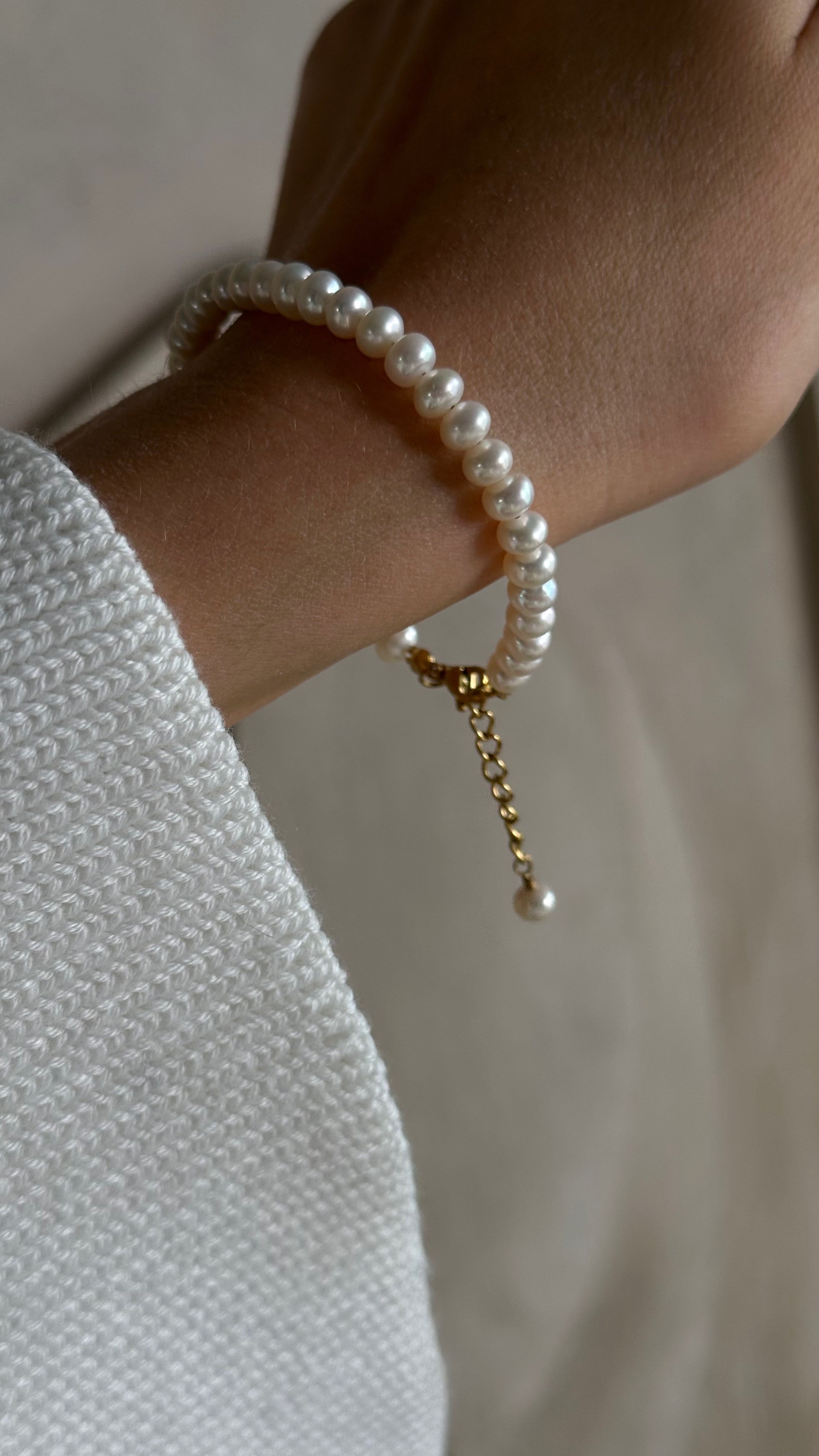 Delicate natural freshwater pearl bracelet featuring genuine pearls and durable stainless steel fittings — timeless, elegant design reflecting understated beauty and sophistication, perfect for meaningful moments and everyday grace.