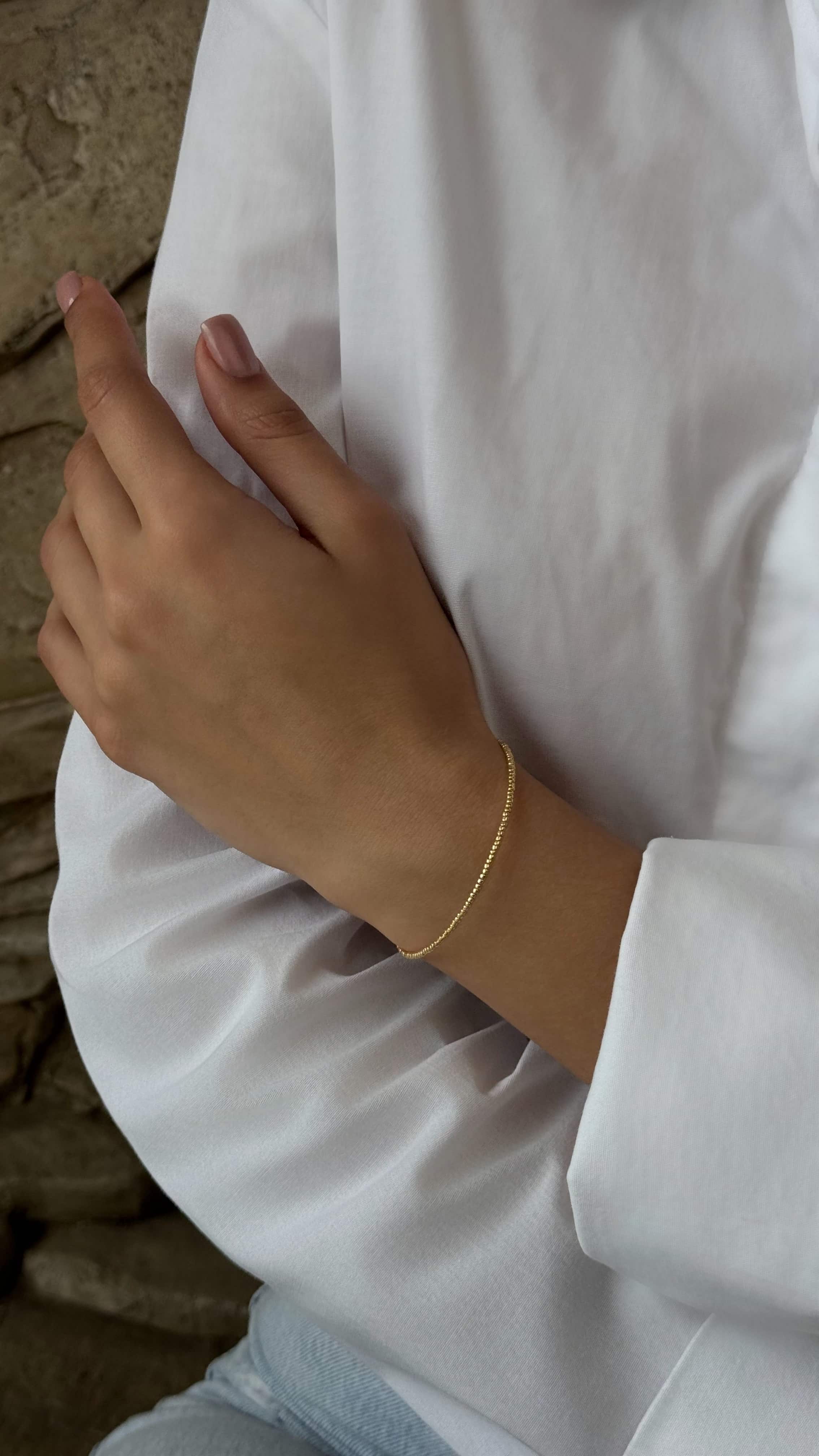Minimalist bracelet made from premium Japanese jewelry-grade seed beads, designed for a perfect wrist fit and versatile wear—solo or layered.