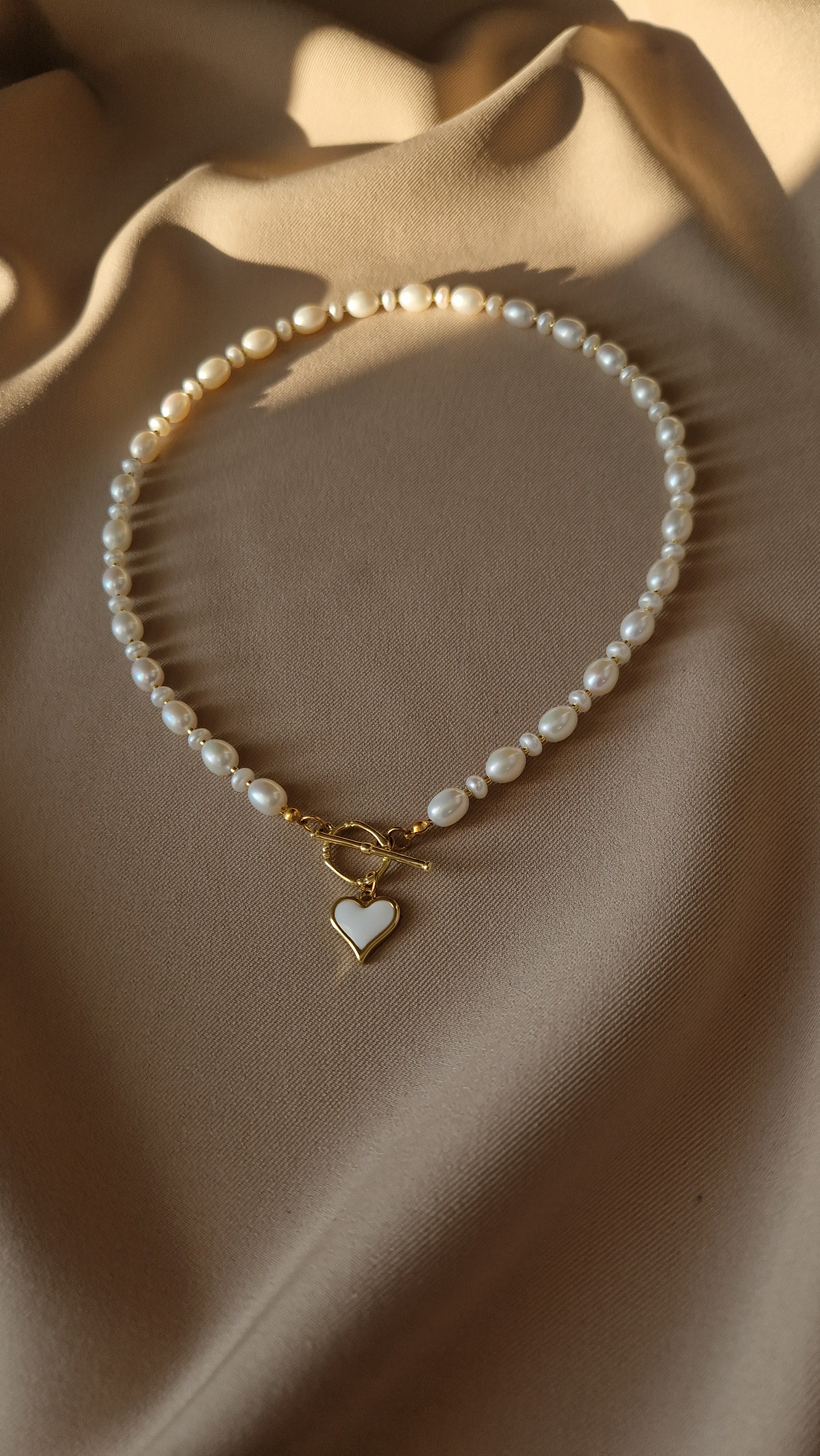 Dainty freshwater pearl choker with gold heart pendant and toggle clasp, elegant handmade coquette-style necklace gift for her