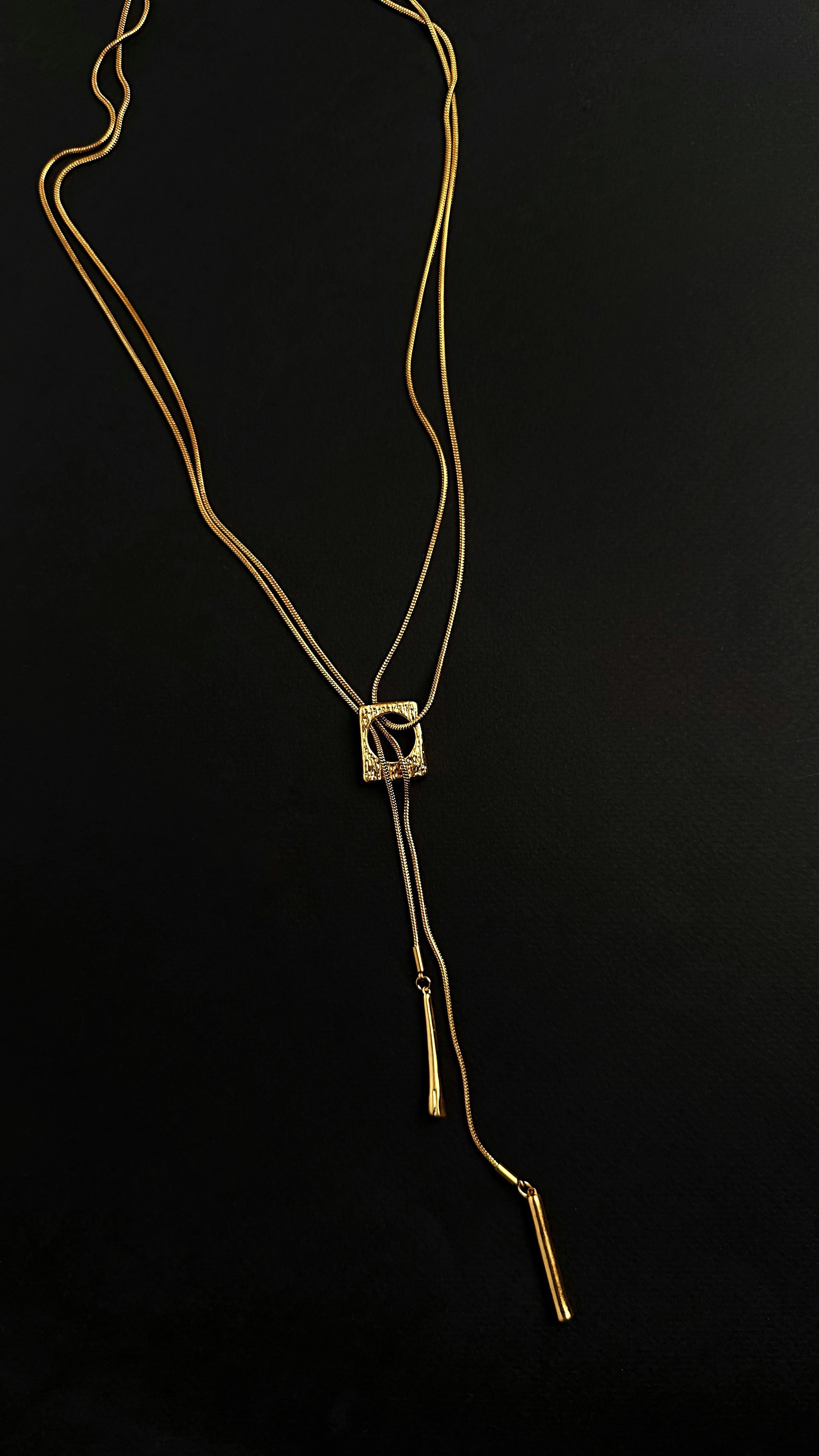 Stylish gold-plated brass chain necklace with a pendant. Universal size